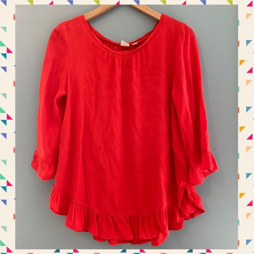 GAP Women's Top with ruffled hem and sleeves  Size Small